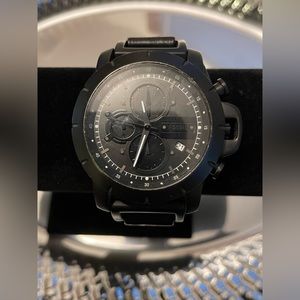 Fossil men’s watch. Chronograph with full leather band. Date feature